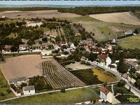 Vues gnrales et vie communale  Au premier plan, la rue Maillot, sur la droit et en remontant, la rue Chteauneuf, puis perpendiculaire, la rue du barrage, et dans le fond,  gauche, la Vieille tour de la butte de Chteauneuf.